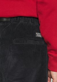 Levi's® Skateboarding SKATE QUICK RELEASE  - Trousers - black