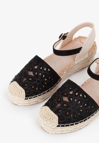 Miriade Sandalias de cuña - nero