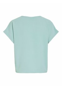 Ανοιχτό μπλε μπλούζα με κοντά μανίκια, ίσια γραμμή στο τελείωμα και χαλαρή, κουτιώδης εφαρμογή, εμφανιζόμενη από πίσω σε λευκό φόντο.