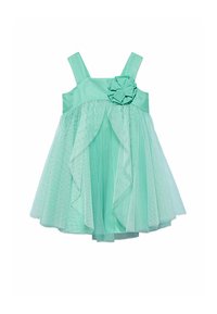 Abito verde menta con corpino aderente, spalline sottili, gonna a strati in tulle e un fiore decorativo in vita. Motivo testurizzato su tutta la superficie.