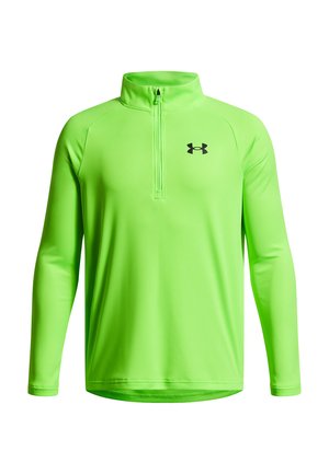 Pull-over à manches longues et à fermeture éclair quart en tissu néon vert vif. Présente un logo noir sur la poitrine et une texture lisse et légère.