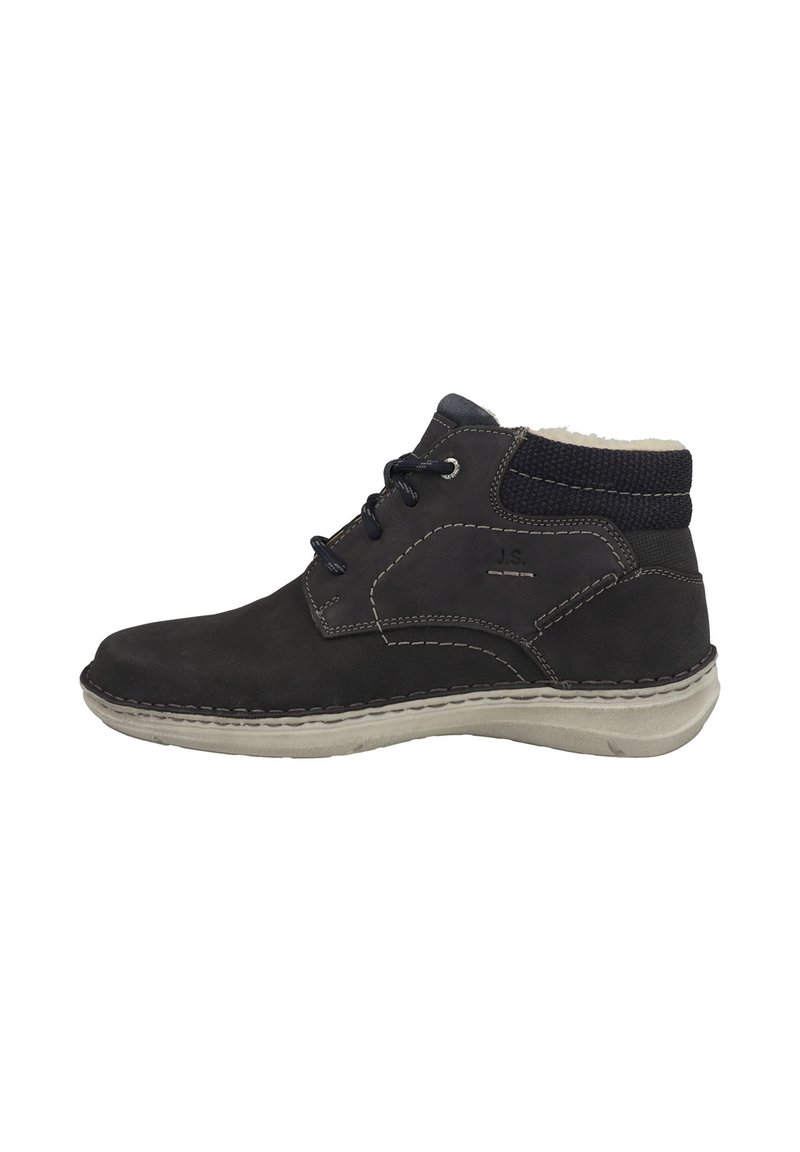 Schwarzer Leder-Ankle-Boot mit einem strukturierten Strickkragen, Schnürung vorne und kontrastierenden Nähten. Gummisohle für besseren Halt.
