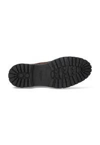 Suela de goma negra con un diseño de relieve profundo para mayor tracción. Acentos hexagonales y una pestaña de tiro integrados en el diseño para mejorar el agarre.