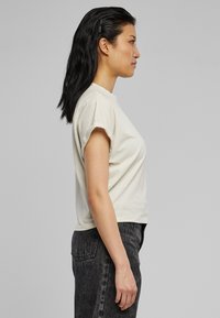 Urban Classics LADIES SHORT PIGMENT DYE CUT ON SLEEVE TEE - Pamata T-krekls - palesasphalt
