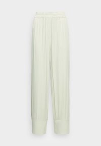 Pantalon droit vert clair avec taille élastique et larges poignets aux chevilles, présenté sur un fond blanc.