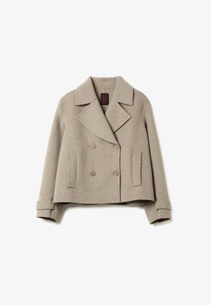Beige wool double-breasted jacket with a notched collar, two front pockets, and buttoned cuffs. Textured fabric with a structured shape.