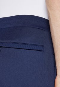 Sergio Tacchini MORET PANTS - Treniņtērpa apakšdaļas - navy
