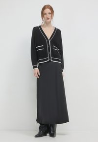 Calliope Strickjacke - nero