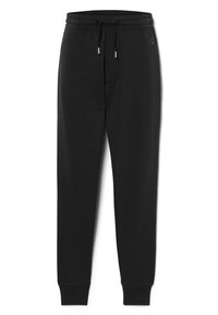 Schwarze Sweatpants mit einem Kordelzugbund, schmal zulaufenden Beinen und gerippten Bündchen. Aus weichem Material gefertigt, mit einer Vorderseite Tasche und dezentem Branding.