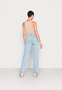 ONLY ONLDAD  - Calças de ganga de corte relaxado - medium blue denim