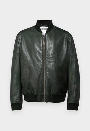 Dark green leather bomber jacket with a zip front, ribbed collar and cuffs, and side pockets. Smooth texture with minimal detailing.
