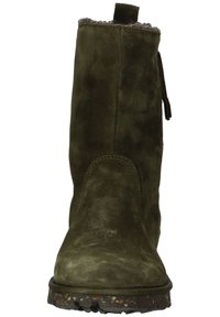 Suede olive green ankle boot with a textured finish, round toe, and pull tab detail, featuring a sturdy, speckled rubber sole.