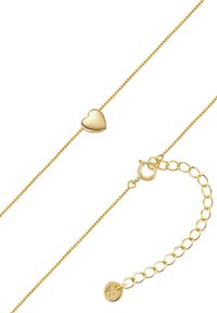 Goldene Kettenarmband mit kleinem Herzanhänger, glatter Oberfläche und einem Karabinerverschluss mit verstellbarer Kette zur Längenvariation.