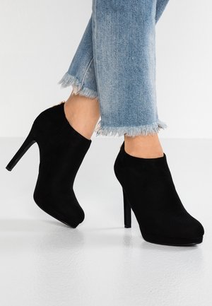 Bottines à talons hauts - black