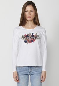 Koroshi Pikkade varrukatega topp - blanco