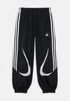 TEAMGEIST LOOSE JUNIOR UNISEX - Spodnji deli trenirk - black/white
