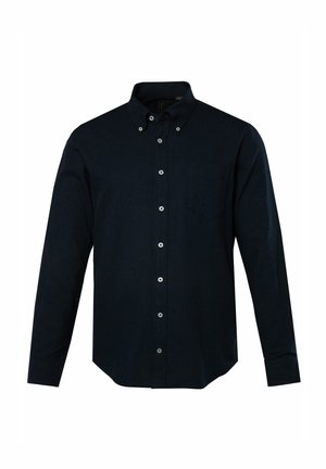 Chemise boutonnée bleu marine foncé à manches longues, avec un col pointu et une poche poitrine simple. Le tissu semble lisse avec une texture subtile.