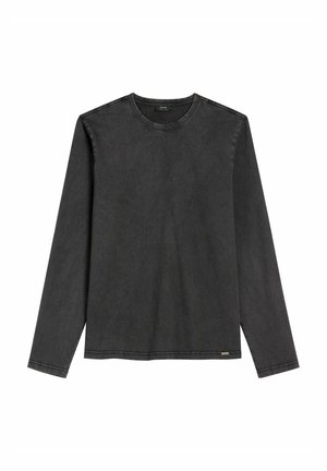 Czarna koszulka z długim rękawem wykonana z miękkiej bawełny, z okrągłym dekoltem, prostym krojem oraz minimalistycznymi przeszyciami dla czystego wzornictwa.