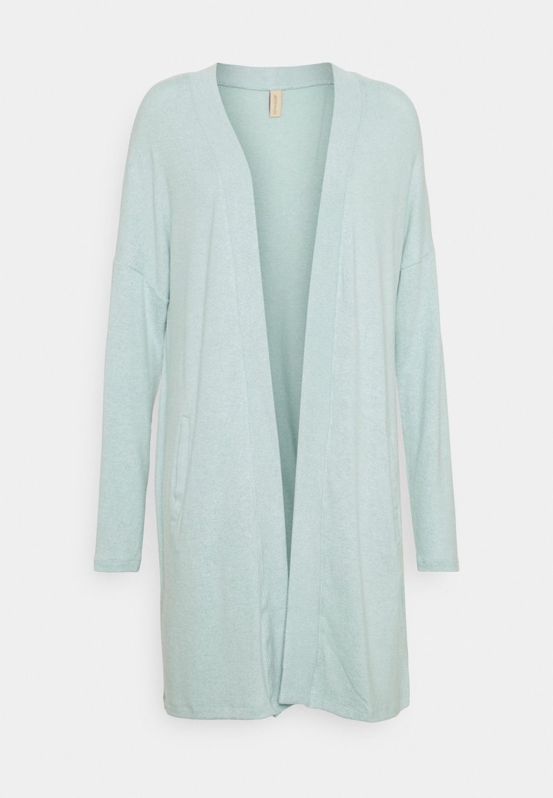 Lys grøn cardigan lavet af blødt stof, med en løs pasform, lange ærmer, åben front og en sidelomme.
