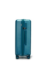 Harde koffer in teal met een geribbelde textuur, dubbele rits, combinatieslot en vier multidirectionele wielen. Compact en functioneel ontwerp.