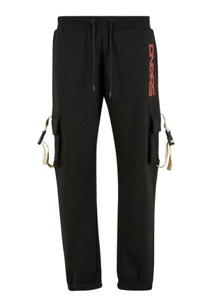Black cargo sweatpants with elastic waist, drawstrings, side pockets with beige straps, and red vertical "DNGRS" text on the right thigh.