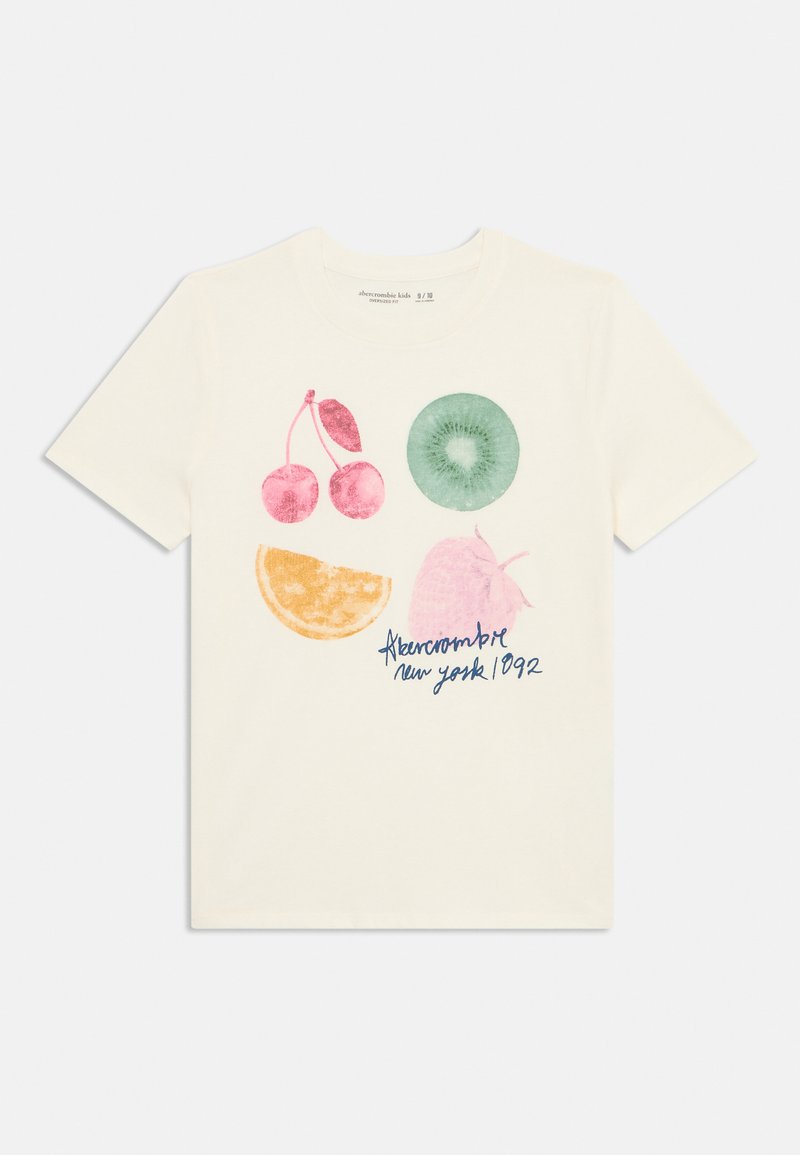 Creme T-shirt med frugt grafik: pink kirsebær, grøn kiwi, appelsinskive, pink jordbær og tekst "Abercrombie New York 1992."