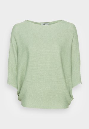 Kerge roheline, lühikeste varrukatega oversized topp, mis on valmistatud ribakanga materjalist; sellel on lai paadi kaelus ja mugav lõige.