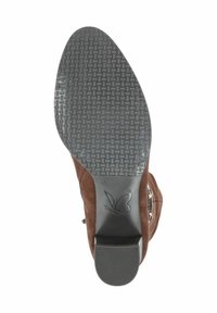 Brown suede boot with a textured, rubber sole. The sole features a butterfly logo and detailed tread pattern for grip.