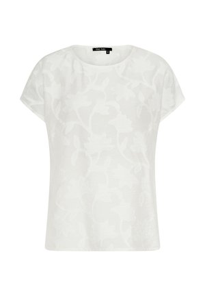 Weiße Bluse mit kurzen Ärmeln und rundem Ausschnitt, versehen mit einem dezenten floralen Jacquardmuster und einem schwarzen Größenschild am Kragen.