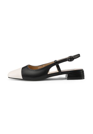 Slingback in bianco e nero con punta affusolata, realizzata in pelle, dotata di tacco spesso e cinturino regolabile. Texture liscia.