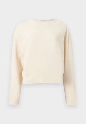 Pulover crop cu mâneci lungi, de culoare crem, cu decolteu rotund, realizat dintr-un material fin tricotat cu dungi.