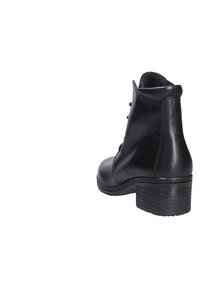Black leather ankle boot with a rounded toe, decorative stitching, and a textured block heel. Features lace-up closure and soft interior lining.