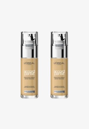 Deux flacons de fond de teint beige avec des pompes argentées, étiquetés "accord parfait" et "L'Oréal Paris", présentant des caractéristiques de technologie d'adaptation à la peau.