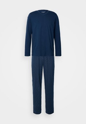 Top a manica lunga V con scollo a V di colore blu navy abbinato a pantaloni a fantasia con un design a diamanti in tonalità più scure di blu navy, realizzati in un tessuto morbido.