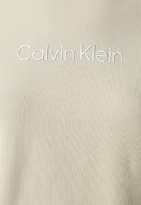 Calvin Klein HERO LOGO HOODIE - Sportinis megztinis - wood ash