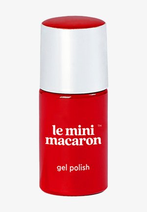 Bottiglia di smalto gel rosso con tappo bianco, caratterizzata dal marchio "le mini macaron" in grassetto bianco. Finitura liscia e lucida con forma rotonda.