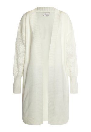 Cardigan bianco lavorato a maglia con frontale lungo aperto, colletto a coste e maniche a sbuffo testurizzate con motivi floreali. Materiale morbido e leggero.