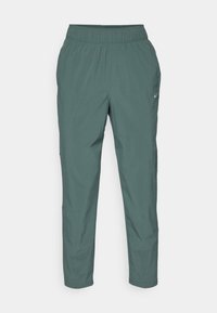 DRI-FIT FAST - Pantalon de survêtement - vintage green/reflective silver