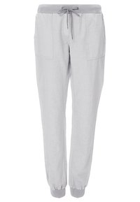 Pantalons de jogging gris clair en tissu doux, avec une taille élastique, un cordon de serrage et des poignets côtelés. Deux poches avant.