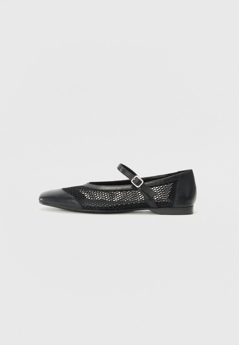 Black flat shoe with a rounded toe, featuring a mesh side panel and a strap with a buckle. Smooth leather toe cap and heel.
