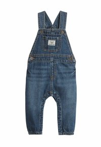Denim overalls met verstelbare banden, steekzak aan de voorkant en elastische manchetten. Heeft een blauwe wassing en knoopdetails.