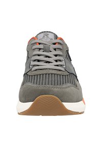 Gray sneaker with a mix of smooth and textured materials. Features striped fabric, gray laces, orange accents, and a rubber sole.