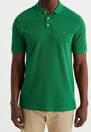 Groene poloshirt van textuur katoen, uitgerust met een klassieke kraag, een drieknoopsluiting en een klein geborduurd logo op de borst.