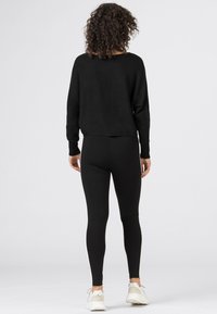 HALLHUBER Leggings - Trousers - black