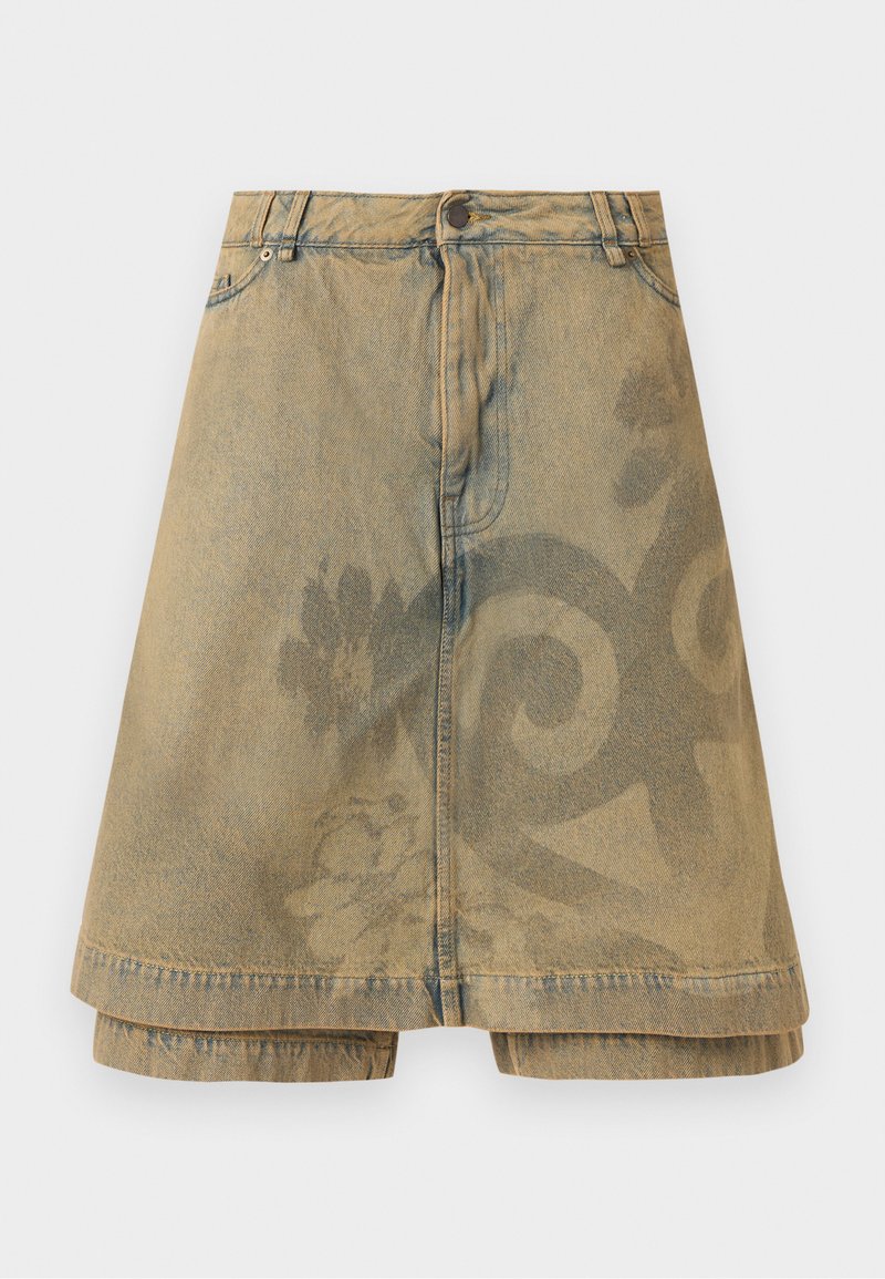 Beežidest teksaseelik, millel on nööpide ja lukuga kinnis, peened lille- ja keerisikirjad ning kihiline ääre detail.