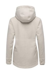 Vaalean beige huppukappa, jossa on pitkät hihat, napitettavat hihansuut ja hieman kaareva helma, esitetty takaa.