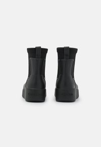 bottes calvin klein caoutchouc