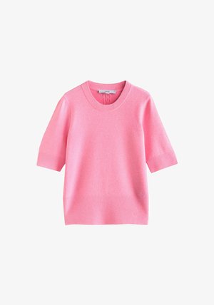 Kurzer rosa Pullover mit kurzen Ärmeln aus weichem Stoff. Verfügt über einen gerippten Halsausschnitt und einen gerippten unteren Saum. Glatte Textur mit einfarbiger Optik.