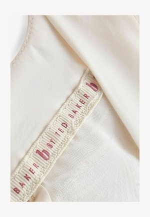 White fabric with smooth texture, featuring a label that reads “Baker by Ted Baker” in pink on cream background.