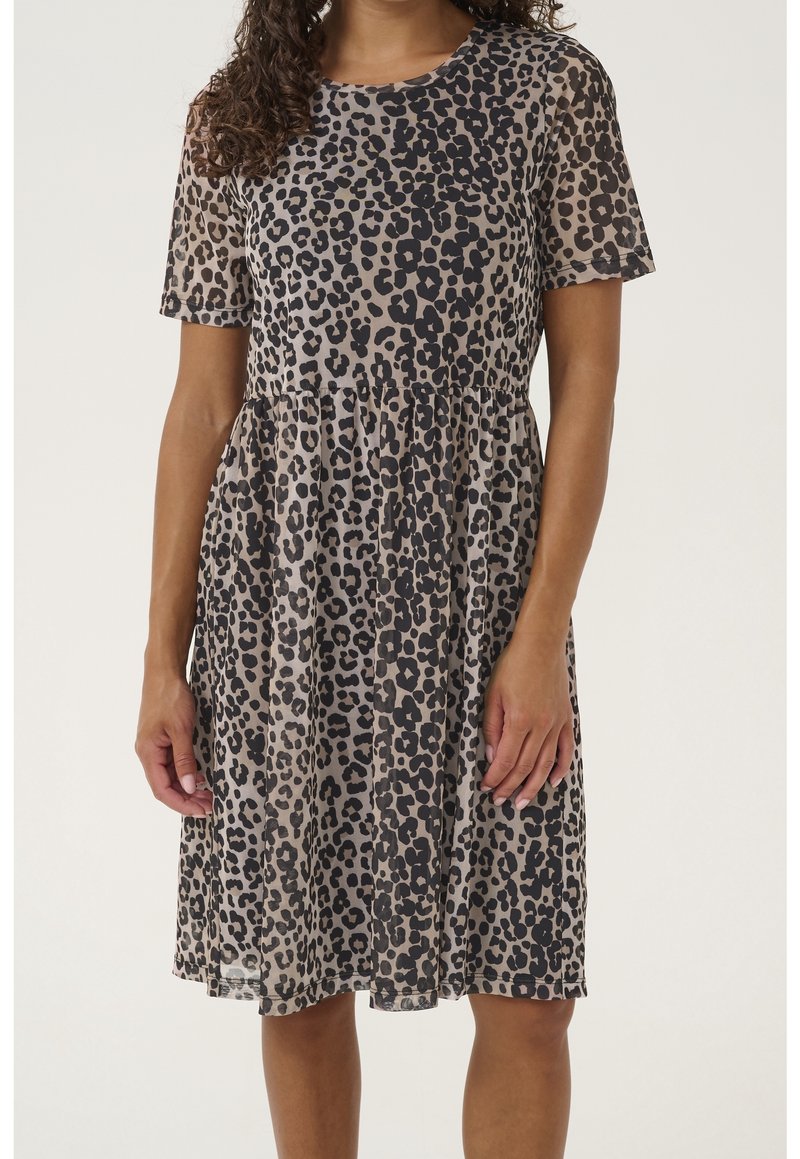 Leopard print dress in beige and black, short sleeves, round neckline, flared skirt, lightweight fabric, partially sheer texture, knee-length.